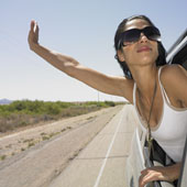 woman leaning out car window